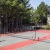 a tennis court with a red court