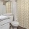 a bathroom with a toilet and sink