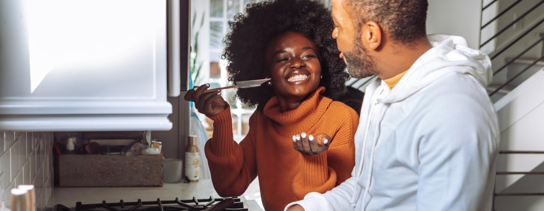 a man and a woman cooking