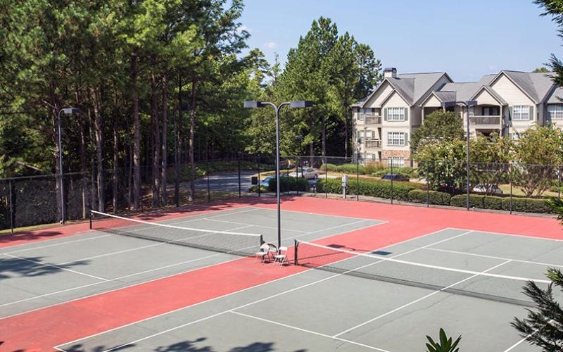 a tennis court with a red court