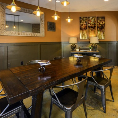 a large conference room with a large table and chairs